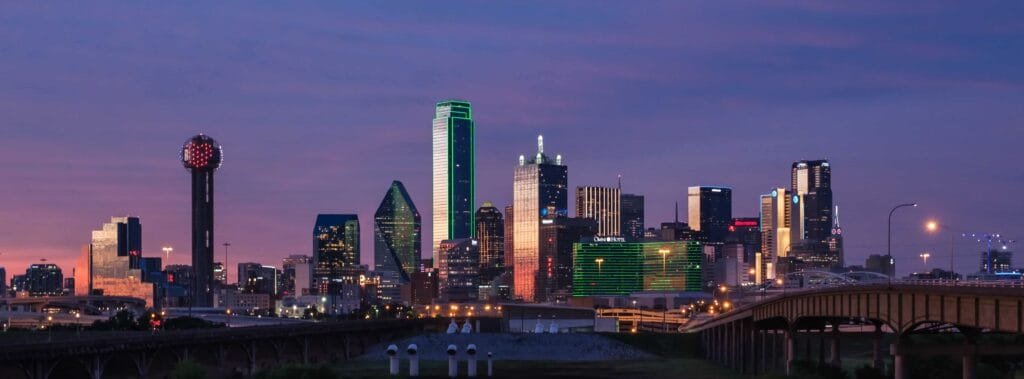 Enjoy the breathtaking skyline of Dallas at dusk while experiencing luxury comfort and convenience with our top-notch limousine service.