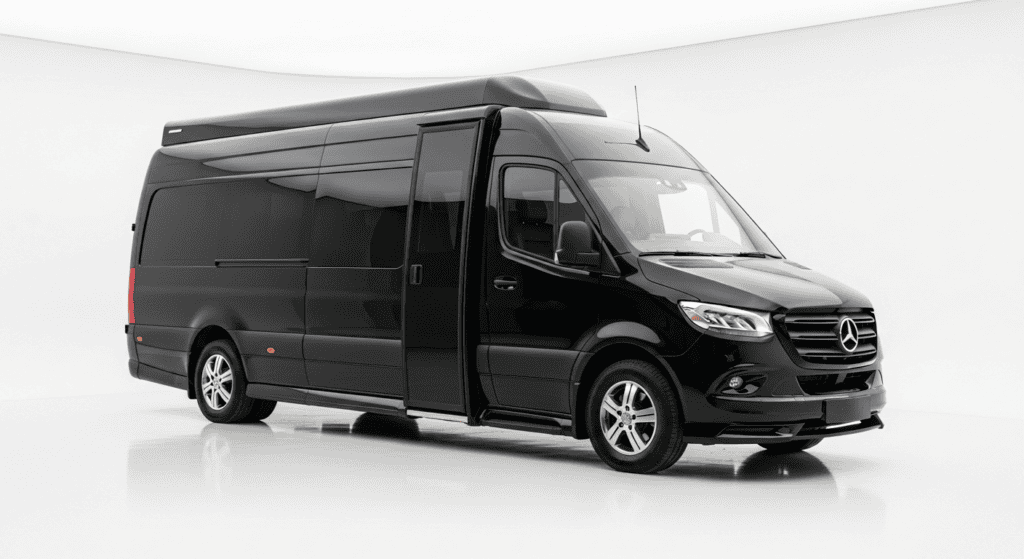 Black Mercedes-Benz van with tinted windows and sleek design.