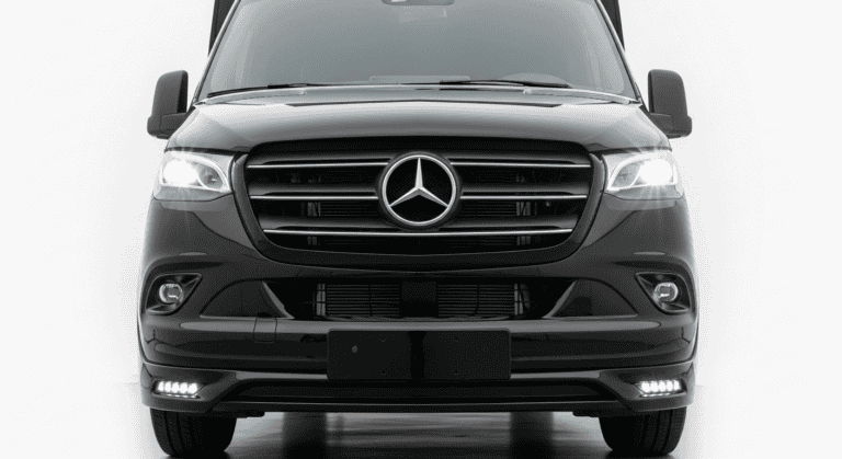 Front view of a black Mercedes-Benz van with sleek design and modern headlights.